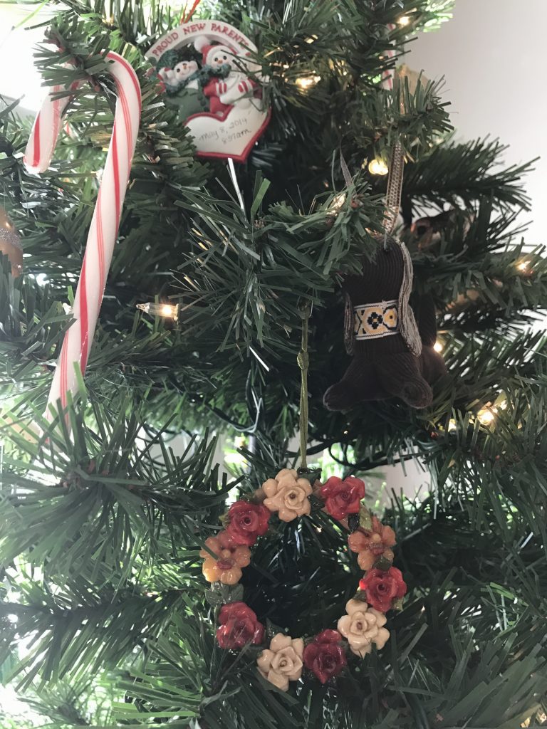 The wreath ornament is one of my most prized possessions - my grandmother sent it to me with a note to "remember me at Christmas". Every year, I get a little teary eyed putting it up. 